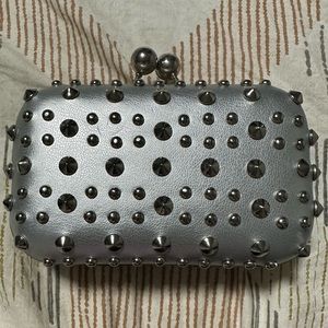 Small silver studded clutch